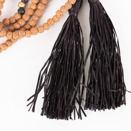 clay beads w black tassel