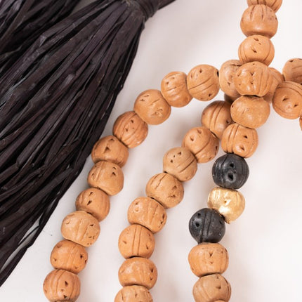 clay beads w black tassel