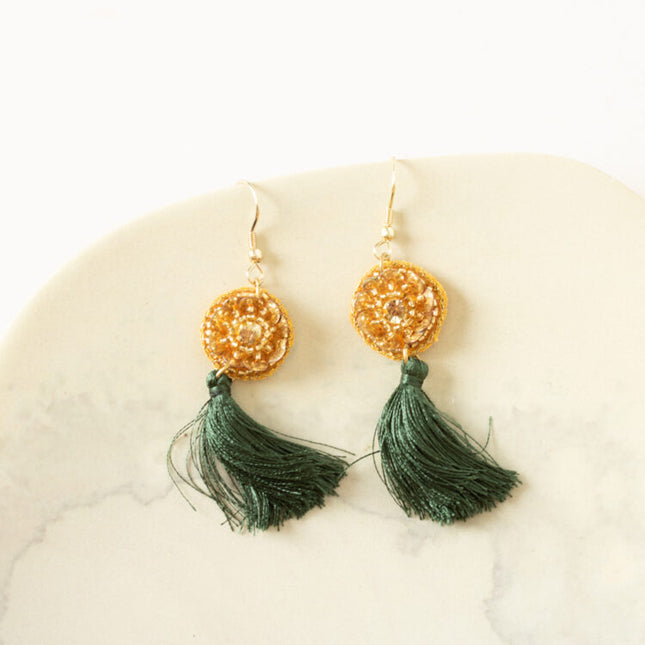 green tassle earrings