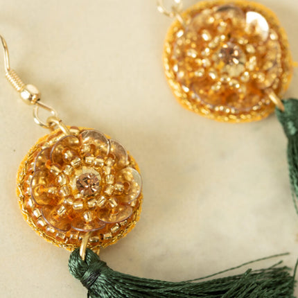 green tassle earrings