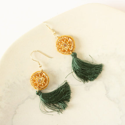 green tassle earrings