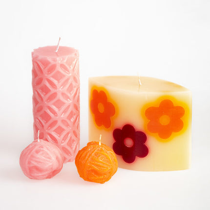pink ball of twine candle