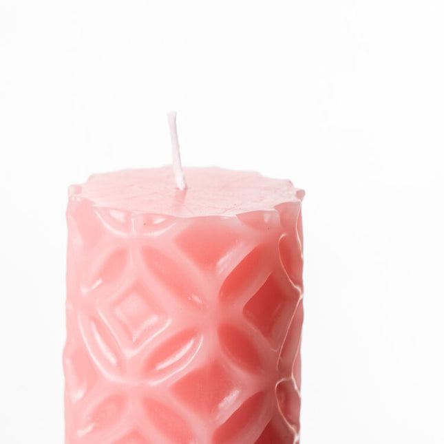 pink tesselation candle