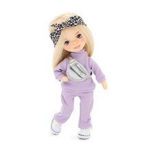 sweet sisters mia in a purple tracksuit